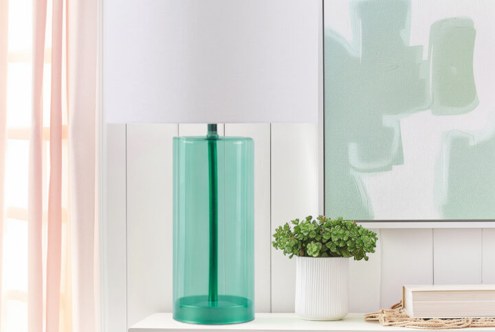 Infuse your space with personality with the 510 Design Neonova table lamp. Boasting a sleek glass body in a captivating blue hue