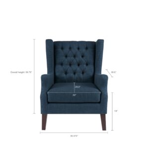 This classic wing chair with its button tufted detailing and sloped arms adds a casual twist with its navy casual woven fabric. Leg assembly required.