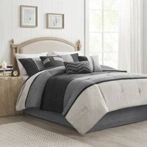 The Madison Park Palisades 7 Piece Faux Suede Comforter Set offers you a casual alternative in fashion bedding. The reverse of the comforter is solid black. The soft microsuede in light grey