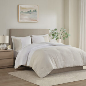 Refresh your bedroom with the subtle beauty of the Beautyrest Miro gauze comforter set. This lightweight comforter features a natural two-tone pieced design that embraces a more casual look with a touch of elegance. Matching shams repeat the modest style of the comforter to complete the oversized bedding set and give your room a chic neutral update that mixes well with a variety of styles.