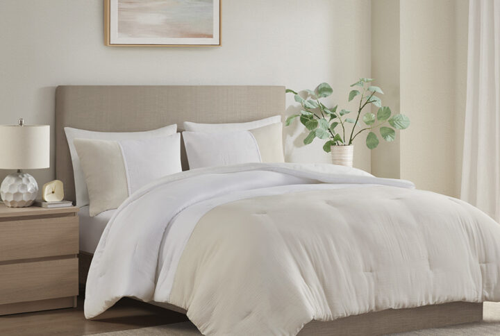 Refresh your bedroom with the subtle beauty of the Beautyrest Miro gauze comforter set. This lightweight comforter features a natural two-tone pieced design that embraces a more casual look with a touch of elegance. Matching shams repeat the modest style of the comforter to complete the oversized bedding set and give your room a chic neutral update that mixes well with a variety of styles.