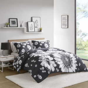 The Maude comforter set features a large scale floral design and reverses to a smaller scale floral design for 2 looks in 1.  This eye-catching black and white comforter gives your bedroom a bold and dramatic update.  The coordinating shams (1 in Twin/Twin XL) repeat the smaller scale floral design to complete the bedding set. The hypoallergenic polyester comforter filling contains no allergens and is treated to be dustproof. This machine washable comforter set also features antimicrobial treatment which keeps the fabric long lasting.