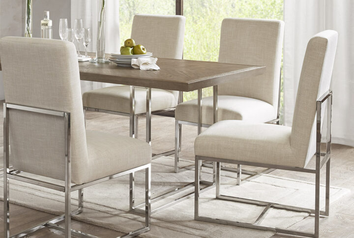 Give your dining room a simple and modern look with the Madison Park Junn Dining Chair 2 Piece Set. Upholstered in a soft natural-hued fabric