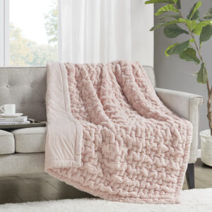 Add a modern and sophisticated touch to any space with the Madison Park Ruched Fur Throw. This throw features a solid ruched fur pattern