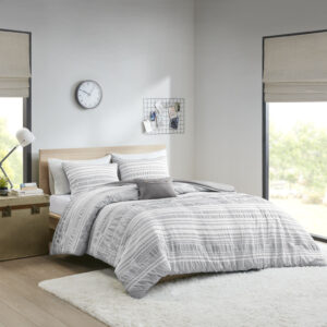 The Intelligent Design Lumi Striped Comforter Set offers a chic casual comfort to your bedroom. This comforter features a modern grey stripe pattern that has a ruched and yarn-dyed look to create dimension