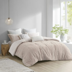 The INK+IVY Kara Cotton Jacquard Comforter Mini Set offers an eye-catching update to your bedroom decor. This comforter features a cotton jacquard stripe design on the face with a blush diamond print on the ivory reverse. The comforter also has a clean