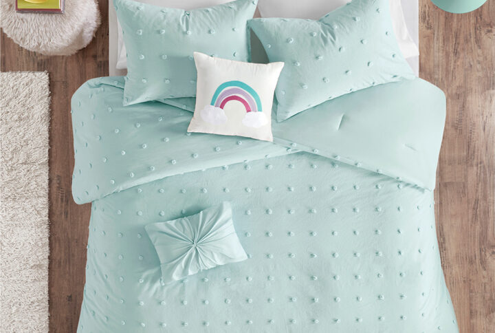 Create a cute and cozy look in your child’s bedroom with the Urban Habitat Kids Callie Cotton Jacquard Pom Pom Comforter Set. This cotton comforter features an all-over jacquard pom pom design that adds texture