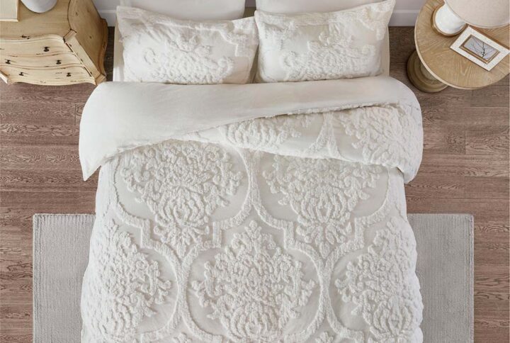 The Madison Park Viola 3 Piece Tufted Cotton Chenille Damask Duvet Cover Set offers the perfect cottage touch to your bedroom décor. A tufted chenille damask design is beautifully displayed on the 100% cotton duvet cover and matching shams