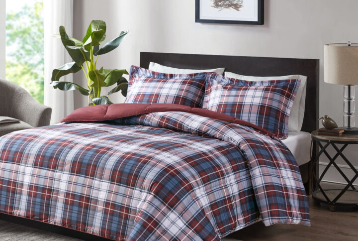 Sleep comfortably with the Madison Park Essentials Parkston 3M Scotchgard Down Alternative Comforter Mini Set. Sporting a cool plaid pattern