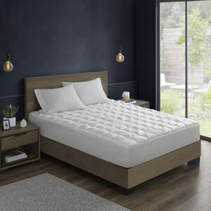 Transform your bedroom into a cozy dream with our Dream Puff mattress pad. The 3D puff stitching creates a beautiful