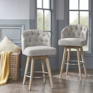 this counter stool is upholstered and accentuated by a button tufted back and a silver nail head trim