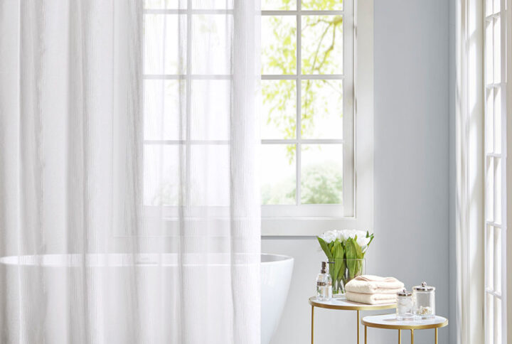 Add a casual update to your bathroom with our Madison Park Anna sheer shower curtain. A striped texture within this shower curtain provides the perfect backdrop for the soft white hue