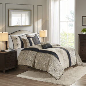 This traditional jacquard comforter features a modern color blocked aesthetic with embroidered medallion details against a lighter base color. The bold vertical stripes effortlessly draw your eyes into this beautiful comforter while the three decorative pillows further accentuate the colors and embroidered details found throughout the collection. Also include are two coordinating shams and a matching solid bed skirt which pull the whole look together. Colors found in this bed set include various shades of tan