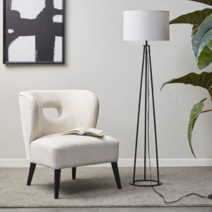 The Martha Stewart Clyde Metal Tripod Floor Lamp 60"H offers a simple and modern update to elevate your living room decor. This floor lamp features a metal tripod base in a matte black finish that creates a slender and sleek contemporary look. The drum shade is not adjustable and is made from white linen to softly filter light and provide a chic contrast to the base of this floor lamp. This tripod floor lamp also uses a foot switch and gives your home a sharp modern accent. 1 Type A light bulb is needed(not included). Spot clean only. Comes with a 2-year warranty.