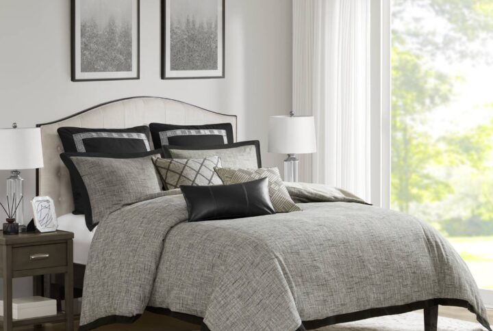 Transform your bedroom into a luxurious sanctuary with the Madison Park Signature Reed 9 Piece King Comforter Set. Crafted from premium polyester chenille jacquard