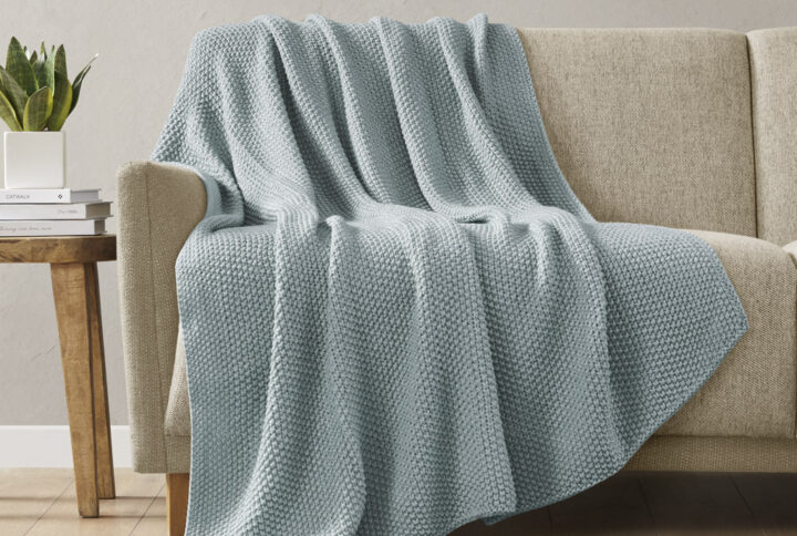 Bundle up in the warm and cozy comfort of the INK+IVY Bree Knit Throw. This ultra-soft