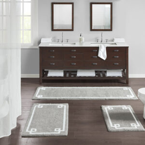 The Madison Park Evan Cotton Tufted Bath Rug provides the perfect balance of comfort and style to update your bathroom. This tufted bath rug features a contrasting white border on a soft colored ground creating a clean hotel look