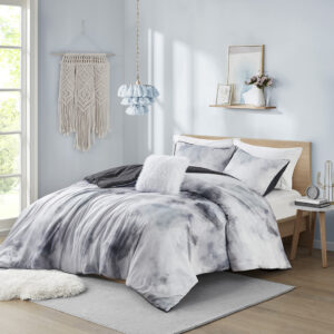 Bring a splash of beautiful colors to your bedroom with the Intelligent Design Cassiopeia Watercolor Tie Dye Printed Duvet Cover Set. This duvet cover features a watercolor tie dye print with piped edge borders to create a colorful dreamy look. The 2 matching shams (1 in Twin/TwinXL) also have piped edges that pair perfectly with the duvet cover