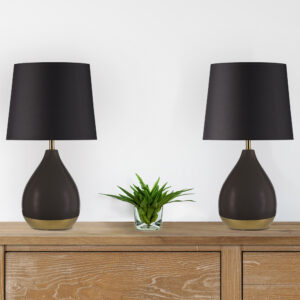 Elevate your space with the Liora table lamp set from 510 Design. This set includes two ceramic lamps