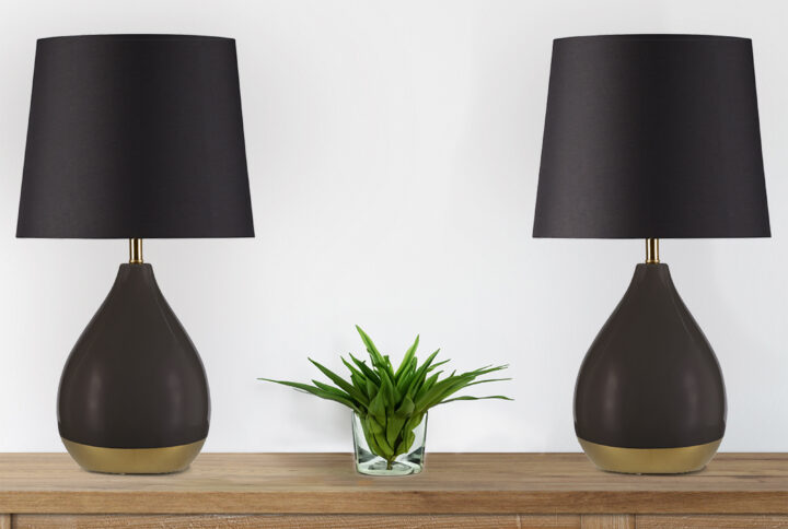 Elevate your space with the Liora table lamp set from 510 Design. This set includes two ceramic lamps