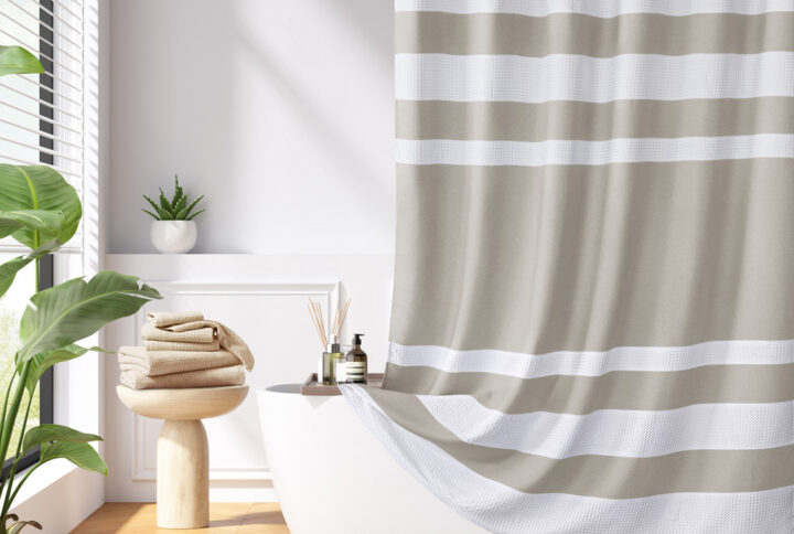 Update your space with the Madison Park Spa Waffle Shower Curtain with 3M Treatment. Featuring a fresh and updated stripe design