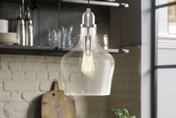 Transform your home with the INK+IVY Auburn 9" Bell Shaped Hanging Glass Pendant Light. This modern fixture features a clear hand-blown glass shade and a chic gold metal base