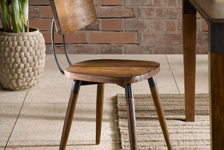 The INK+IVY Frazier Dining Chair Set brings a warm industrial charm to your dining room decor. Each dining chair