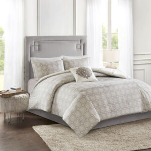 while the reverse showcases an all-over grey medallion print that complements the top of the bed. Two matching shams mirror the face of the cotton duvet cover and an embroidered medallion design on the square decorative pillow provides an elegant finishing touch to the cotton duvet cover set. Machine washable for easy care