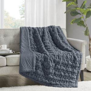 Add a modern and sophisticated touch to any space with the Madison Park Ruched Fur Throw. This throw features a solid ruched fur pattern