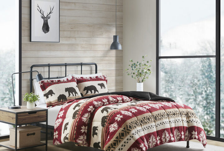 Bring warmth and comfort to your bedroom with the Woolrich Tunbridge Printed Sherpa Comforter Set. Featuring a cabin print including bears