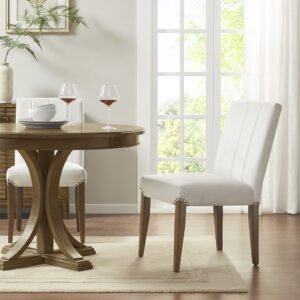 Refine the look of your dining room with the Madison Park Audrey Dining Chair Set of 2. Each accent dining chair is upholstered in a rich cream fabric and features vertical channel stitching on the back