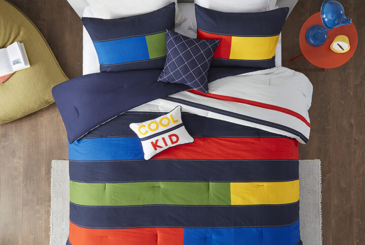 The Urban Habitat Kids Morris comforter features a colorblock striped print that will brighten up your kid's bedroom. This cotton comforter set brings a fun and playful style to their space