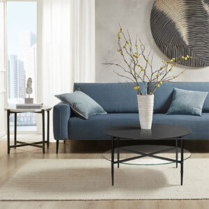 The Martha Stewart Caroline Round Coffee Table with Interchangeable Wood and Glass Top offers a bold and eye-catching centerpiece for your living room. This round coffee table features a clear tempered glass table top and lower wood shelf