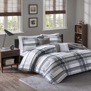 Bring casual comfort to your bedroom with the Intelligent Design Rudy Plaid Comforter Set. Featuring bold black and grey hues