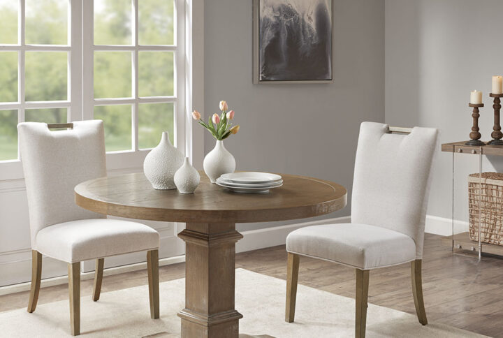 Complete your dining decor with the clean and elegant style of the Madison Park Braiden Dining Chair Set. These austere dining chairs flaunt natural hued upholstery on the rectangular seat and tight back