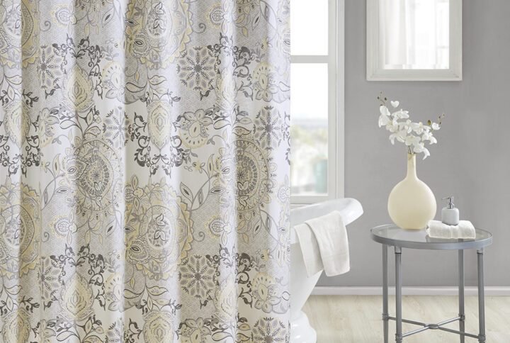 Refresh your bathroom with our Madison Park Isla shower curtain. This printed shower curtain flaunts a beautiful floral and medallion motif in soft yellow and black watercolor hues. While the 100% cotton percale base adds natural appeal for an organic touch to any decor. Machine washable for easy care