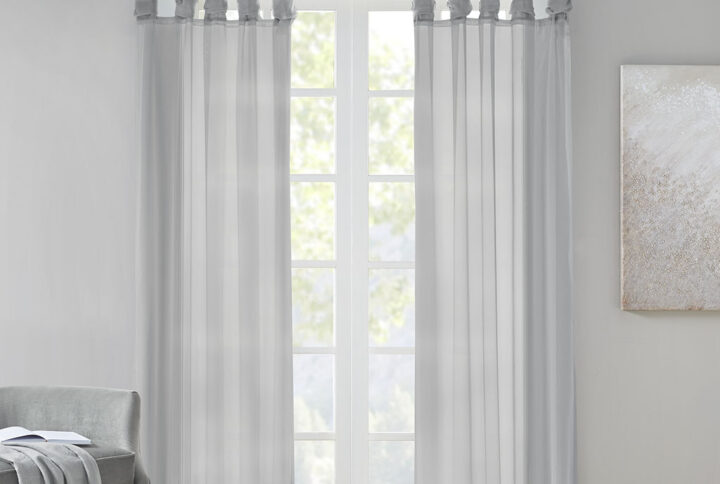 Soften your space with the Madison Park Ceres Twisted Tab Voile Sheer Window Pair. This soft panel pair provides a simple and airy update to your decor