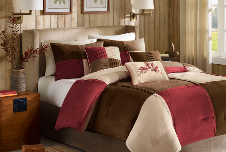 The Jackson Blocks collection combines a casual look with pure comfort. The densely filled comforter and matching shams are made from pieced microsuede that comes together at each seam with pintucking details for added dimension. The large blocks of color bring warmth to the look of the set with deep red