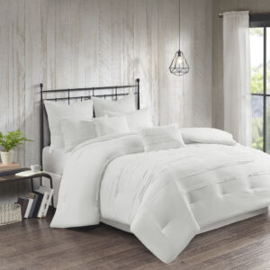 Bring a casual farmhouse look to your bedroom decor with the 510 Design Jenda 8 Piece Comforter Set. The white comforter and shams feature raw edge ribbon detailing that add dimension and texture to the top of the bed. Matching solid white Euro shams complement the casual bedding set