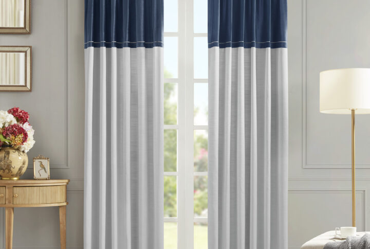 This luxurious curtain features dual-sided hanging options with rod pockets on the top and bottom. The fabrication on one side is a rich velvet fabric with a sophisticated cattail pattern embroidery stitch at the edge. On the other side