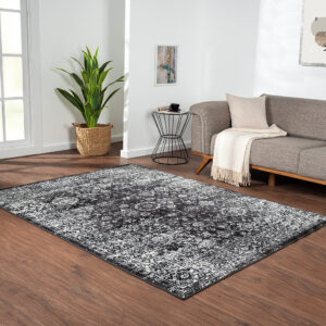 The Madison Park Chadwick Distressed Vintage Persian Black and Cream Woven Area Rug brings bold color and style to your home. This Persian-inspired rug features a distressed vintage design in contrasting shades of black and cream