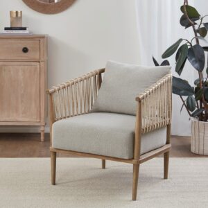 Elevate your living room with the unique trendy style of the Madison Park Odessa Accent Arm Chair. This lounge chair features an open weave jute twine rope design around the solid wood arms and back