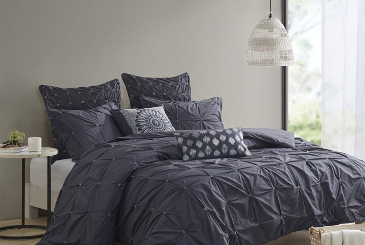 Elevate your bedroom with the INK+IVY Masie 3 Piece Elastic Embroidered Cotton Duvet Cover Set. This solid cotton duvet cover features elastic and embroidered details on the face to create a tufted-inspired design with a modern flair. The 2 matching shams handsomely pair with the cotton duvet cover to complete this modern and sophisticated bedding set. This cotton duvet cover set uses an antimicrobial treatment that provides built-in freshness protection