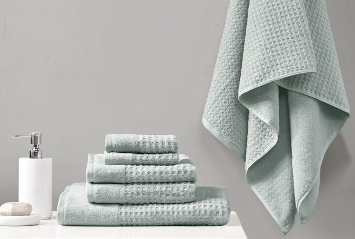 Our Madison Park Spa Waffle Cotton Towel 6 Piece Set provides the perfect textured update to your bathroom decor. This 100% cotton towel set features an all-over waffle combed jacquard design for a rich texture