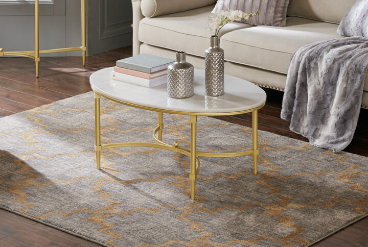 The Madison Park Signature Bordeaux Coffee Table transforms your living room with its sophisticated traditional style. Flaunting a high-class look