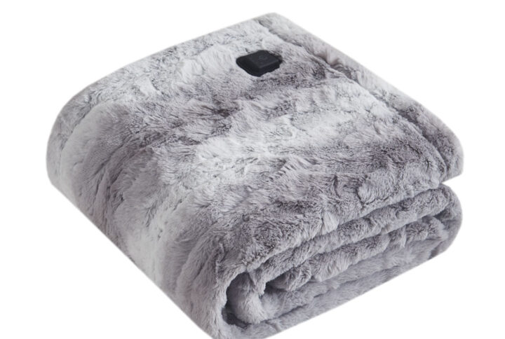 Relax in pure cozy comfort with the Beautyrest Zuri Heated Wrap with Built-in Controller. Made from ultra-soft fur with a plus reverse