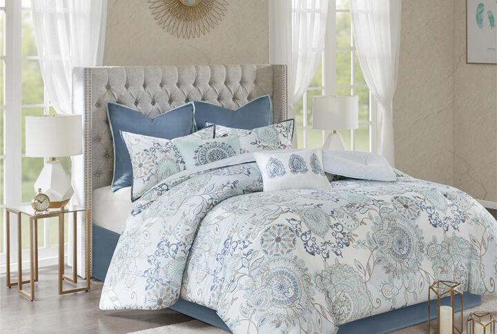 Refresh your bedroom with the Madison Park Isla 8 Piece Cotton Printed Reversible Comforter Set. The 100% cotton comforter and shams flaunt a botanical floral design with a medallion motif printed in soft watercolor hues. A printed pattern on the reverse complements the top of the bed. Two solid Euro shams and a solid bed skirt add a rich touch of color to the bedding set