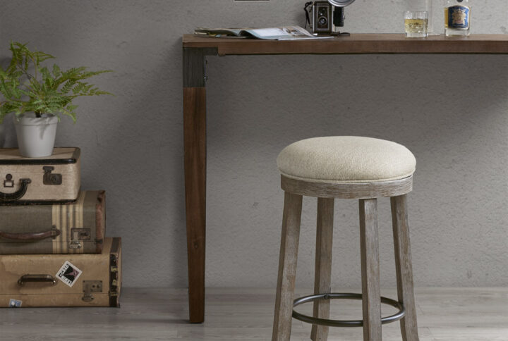 Introduce a natural allure to your space with the INK+IVY Oaktown Swivel Counter Stool. A comfortable upholstered seat is perfectly supported by the lightly distressed grey frame