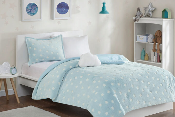 Sleep under the stars with the Mi Zone Kids Quinny Glow in the Dark Plush Comforter Set. The plush aqua comforter and shams (1 in Twin/TwinXL) feature glow-in-the-dark stars to create a whimsical look that bathes your kid’s room in starlight. A cloud-shaped decorative pillow is also included to complete the incredibly soft glow-in-the-dark bedding set. Soft and cozy