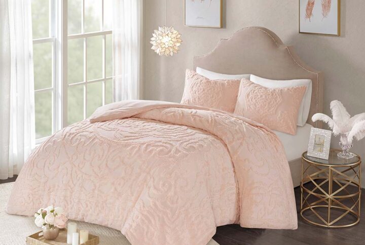 The Madison Park Laetitia Tufted Cotton Chenille Medallion Comforter Set provides an alluring shabby chic update to your bedroom. This globally inspired comforter features a 100% cotton face and reverse with a tufted chenille medallion centered on top of the bed. The 2 matching shams (1 in Twin/Twin XL) coordinate with the cotton comforter to complete the boho look. Perfect for all season use